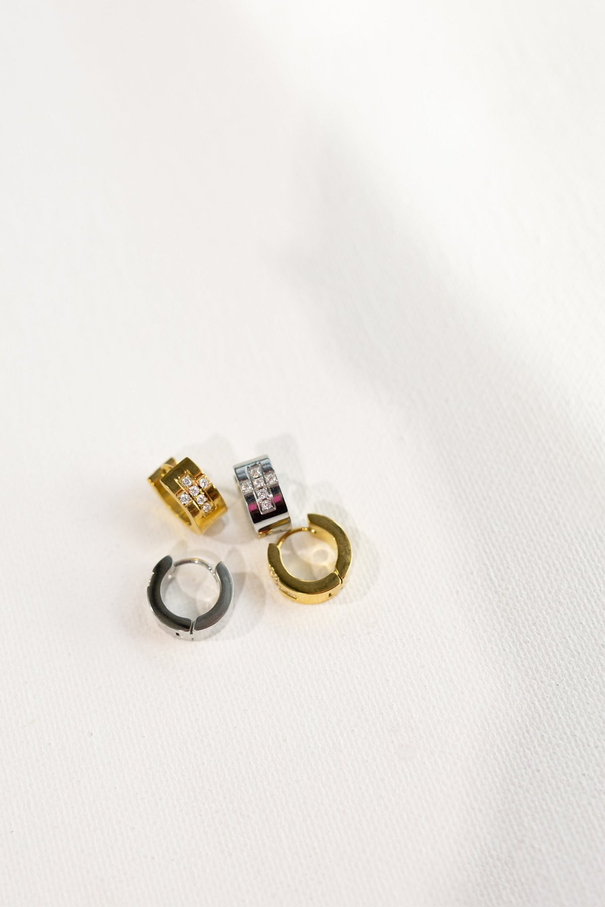 Ezri Crystal Cross Huggie Earrings || Choose Color